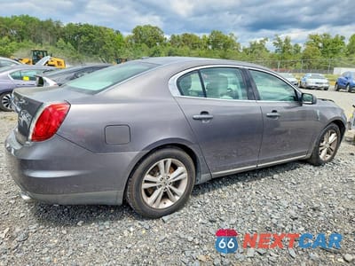 Trzecie zdjęcie samochodu z tyłu: 2011 LINCOLN MKS VIN:1LNHL9DR3BG607748 - miniatura