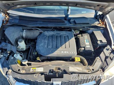 Zdjęcie 12 z 13 samochodu: 2013 DODGE GRAND CARAVAN SE VIN:2C4RDGBG3DR703280 - miniatura