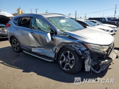 Czwarte zdjęcie samochodu z boku: 2017 HONDA CR-V TOURING VIN:2HKRW1H93HH505480 - miniatura