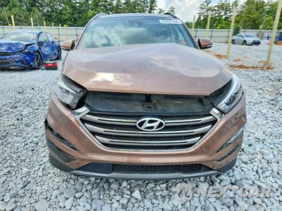 Piąte zdjęcie samochodu w środku: 2016 HYUNDAI TUCSON LIMITED VIN:KM8J33A28GU225522 - miniatura