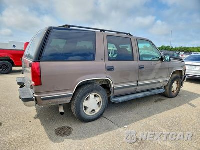 Trzecie zdjęcie samochodu z tyłu: 1997 CHEVROLET TAHOE K1500 VIN:1GNEK13RXVJ314652 - miniatura