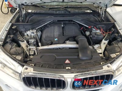 Zdjęcie 11 z 12 samochodu: 2014 BMW X5 SDRIVE35I VIN:5UXKR2C54E0C01958 - miniatura