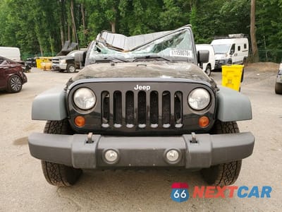 Piąte zdjęcie samochodu w środku: 2011 JEEP WRANGLER SPORT VIN:1J4AA2D17BL504752 - miniatura