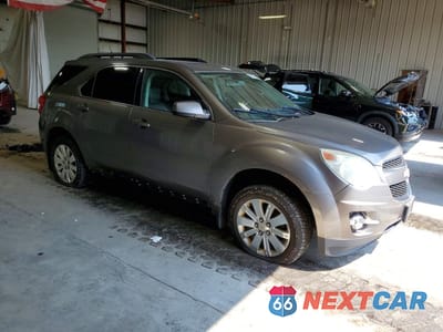 Czwarte zdjęcie samochodu z boku: 2011 CHEVROLET EQUINOX LT VIN:2CNFLNE57B6278161 - miniatura