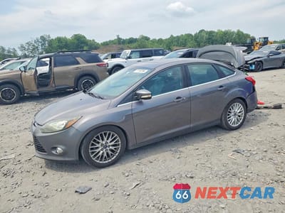 2014 FORD FOCUS TITANIUM 1FADP3J27EL101403 - główne zdjęcie licytacji z USA - miniatura