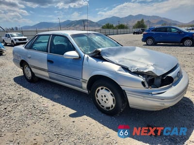 Czwarte zdjęcie samochodu z boku: 1995 FORD TAURUS GL/SE VIN:1FALP5244SG323943 - miniatura