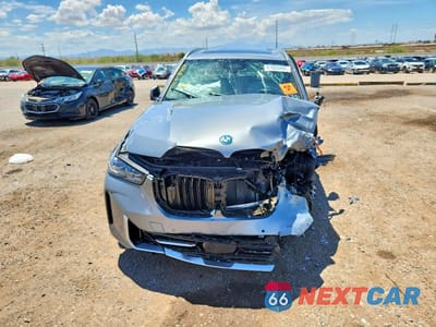 Piąte zdjęcie samochodu w środku: 2026 BMW X5 XDRIVE50E VIN:5UX43EU08T9458934 - miniatura