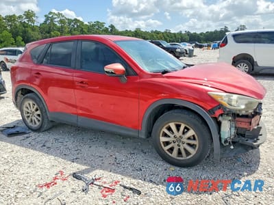 Czwarte zdjęcie samochodu z boku: 2015 MAZDA CX-5 TOURING VIN:JM3KE2CY9F0486427 - miniatura