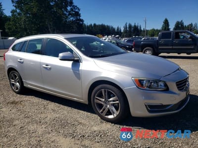 Czwarte zdjęcie samochodu z boku: 2015 VOLVO V60 PREMIER VIN:YV1612SB9F1186314 - miniatura