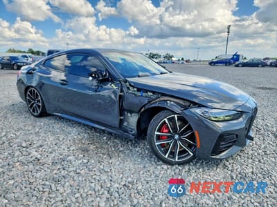 Czwarte zdjęcie samochodu z boku: 2022 BMW 430I VIN:WBA53AP09NCK91254 - miniatura