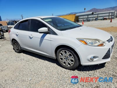 Czwarte zdjęcie samochodu z boku: 2012 FORD FOCUS SE VIN:1FAHP3F25CL196809 - miniatura