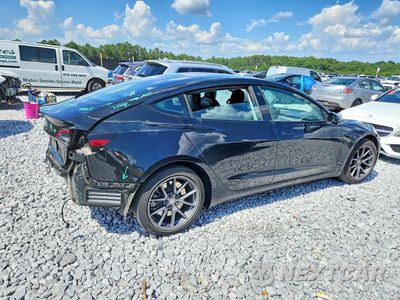 Trzecie zdjęcie samochodu z tyłu: 2021 TESLA MODEL 3 VIN:5YJ3E1EB0MF035613 - miniatura