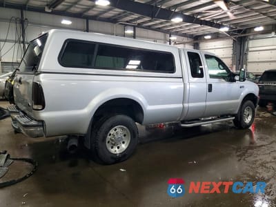 Trzecie zdjęcie samochodu z tyłu: 1999 FORD F250 SUPER DUTY VIN:1FTNX21F9XEC84600 - miniatura