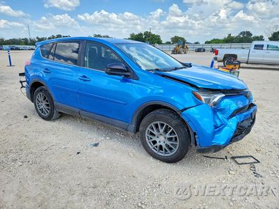 Czwarte zdjęcie samochodu z boku: 2018 TOYOTA RAV4 LE VIN:JTMZFREV4JJ160649 - miniatura
