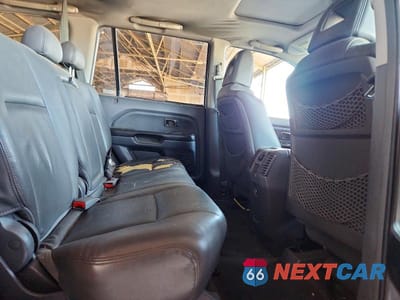 Zdjęcie 11 z 13 samochodu: 2005 HONDA PILOT EXL VIN:5FNYF18575B044481 - miniatura