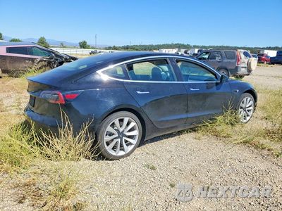 Trzecie zdjęcie samochodu z tyłu: 2019 TESLA MODEL 3 VIN:5YJ3E1EA1KF407450 - miniatura