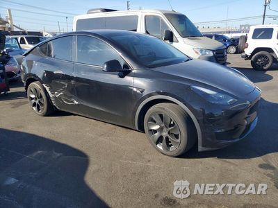 Czwarte zdjęcie samochodu z boku: 2023 TESLA MODEL Y VIN:7SAYGDEEXPA169304 - miniatura