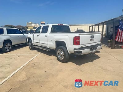 Trzecie zdjęcie samochodu z tyłu: 2015 GMC SIERRA K2500 DENALI VIN:1GT120E85FF601018 - miniatura