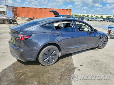 Trzecie zdjęcie samochodu z tyłu: 2024 TESLA MODEL 3 VIN:5YJ3E1EA4RF740963 - miniatura