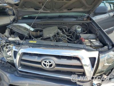 Zdjęcie 11 z 12 samochodu: 2010 TOYOTA TACOMA ACCESS CAB VIN:5TETX4CNXAZ673872 - miniatura