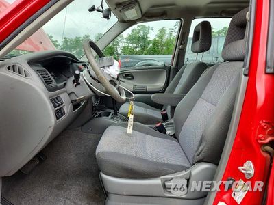 Zdjęcie 7 z 13 samochodu: 2004 CHEVROLET TRACKER VIN:2CNBE134846917582 - miniatura