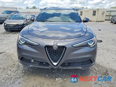 Piąte zdjęcie samochodu w środku: 2022 ALFA ROMEO STELVIO TI VIN:ZASPAKBN8N7D38431 - miniatura