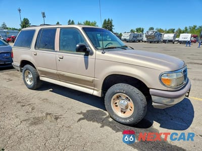 Czwarte zdjęcie samochodu z boku: 1997 FORD EXPLORER VIN:1FMDU34E9VZB66657 - miniatura