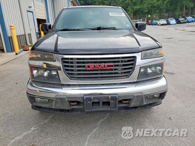 Piąte zdjęcie samochodu w środku: 2012 GMC CANYON SLE VIN:1GTH6MFE4C8106825 - miniatura