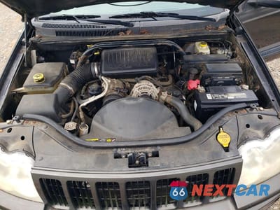 Zdjęcie 12 z 13 samochodu: 2005 JEEP GRAND CHEROKEE LAREDO VIN:1J4HR48N55C609584 - miniatura