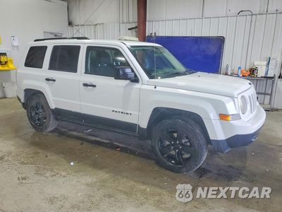 Czwarte zdjęcie samochodu z boku: 2014 JEEP PATRIOT SPORT VIN:1C4NJPBA1ED691525 - miniatura