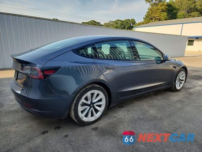 Trzecie zdjęcie samochodu z tyłu: 2022 TESLA MODEL 3 VIN:5YJ3E1EA1NF286889 - miniatura