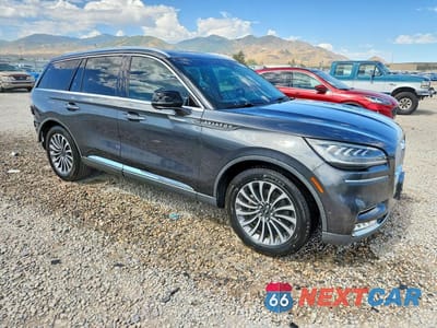 Czwarte zdjęcie samochodu z boku: 2020 LINCOLN AVIATOR RESERVE VIN:5LM5J7WC1LGL04052 - miniatura