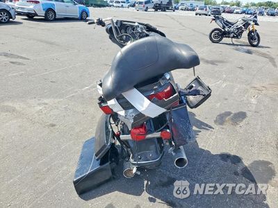 Czwarte zdjęcie samochodu z boku: 2011 HARLEY-DAVIDSON FLHTK VIN:1HD1KEM12BB644457 - miniatura