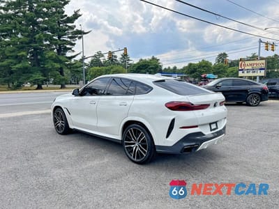 Trzecie zdjęcie samochodu z tyłu: 2021 BMW X6 SDRIVE 40I VIN:5UXCY4C01M9E83977 - miniatura