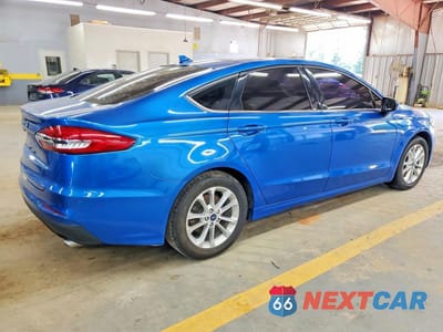Trzecie zdjęcie samochodu z tyłu: 2019 FORD FUSION SE VIN:3FA6P0HDXKR217867 - miniatura