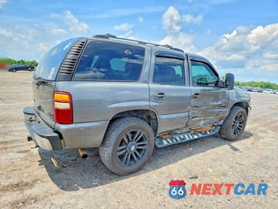 Trzecie zdjęcie samochodu z tyłu: 2001 GMC YUKON VIN:1GKEK13T11J229685 - miniatura