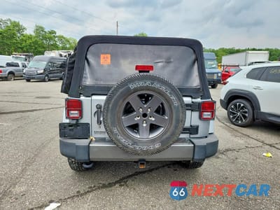 Zdjęcie 6 z 12 samochodu: 2015 JEEP WRANGLER SPORT VIN:1C4AJWAG4FL590002 - miniatura