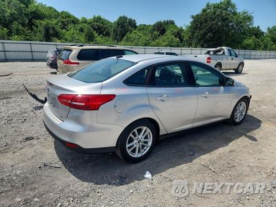 Trzecie zdjęcie samochodu z tyłu: 2016 FORD FOCUS SE VIN:1FADP3F20GL208188 - miniatura