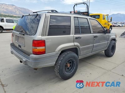Trzecie zdjęcie samochodu z tyłu: 1998 JEEP GRAND CHEROKEE LAREDO VIN:1J4GZ58Y2WC157042 - miniatura
