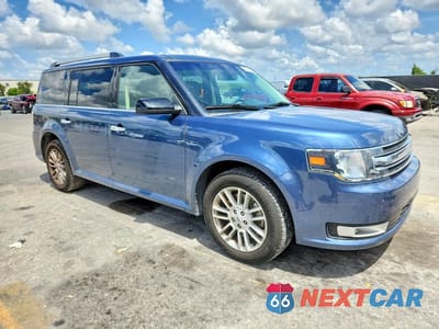 Czwarte zdjęcie samochodu z boku: 2018 FORD FLEX SEL VIN:2FMGK5C81JBA10488 - miniatura