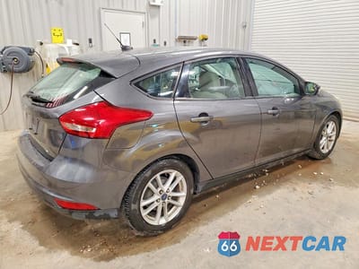 Trzecie zdjęcie samochodu z tyłu: 2016 FORD FOCUS VIN:1FADP3K20GL363426 - miniatura