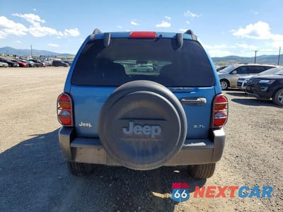 Zdjęcie 6 z 12 samochodu: 2003 JEEP LIBERTY SPORT VIN:1J4GK48K53W664876 - miniatura