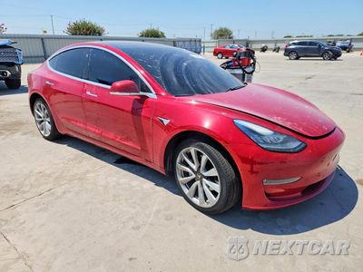Czwarte zdjęcie samochodu z boku: 2018 TESLA MODEL 3 VIN:5YJ3E1EA5JF015439 - miniatura