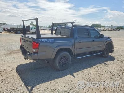 Trzecie zdjęcie samochodu z tyłu: 2019 TOYOTA TACOMA TRD SPORT VIN:3TMCZ5AN3KM217469 - miniatura