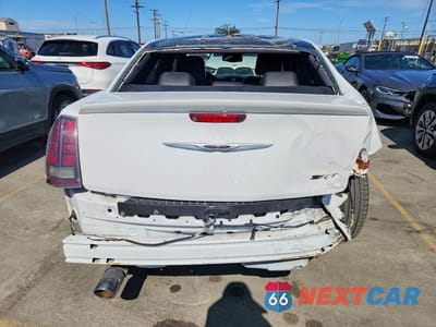 Zdjęcie 6 z 12 samochodu: 2014 CHRYSLER 300 SRT-8 6.4L VIN:2C3CCAFJ7EH257870 - miniatura