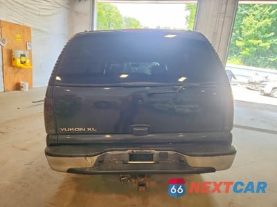 Zdjęcie 6 z 13 samochodu: 2004 GMC YUKON XL K1500 VIN:3GKFK16T74G101750 - miniatura