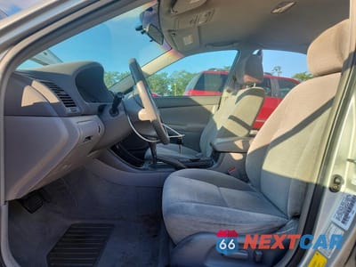 Zdjęcie 7 z 12 samochodu: 2003 TOYOTA CAMRY LE VIN:4T1BE30K03U750276 - miniatura