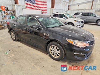 Czwarte zdjęcie samochodu z boku: 2017 KIA OPTIMA LX VIN:5XXGT4L34HG164767 - miniatura