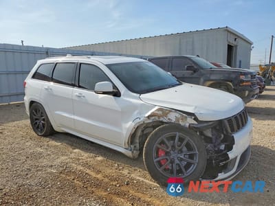 Czwarte zdjęcie samochodu z boku: 2018 JEEP GRAND CHEROKEE OVERLAND VIN:1C4RJFCT3JC503390 - miniatura