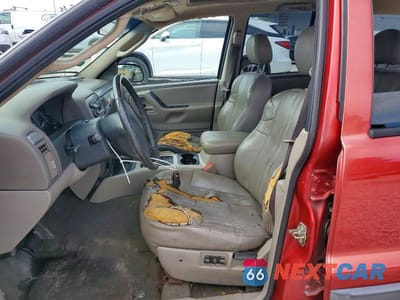 Zdjęcie 7 z 12 samochodu: 2003 JEEP GRAND CHEROKEE LAREDO VIN:1J4GX48N03C539023 - miniatura